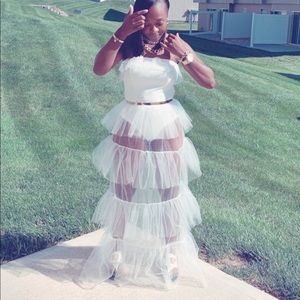 Beautiful long off the shoulder white dress.